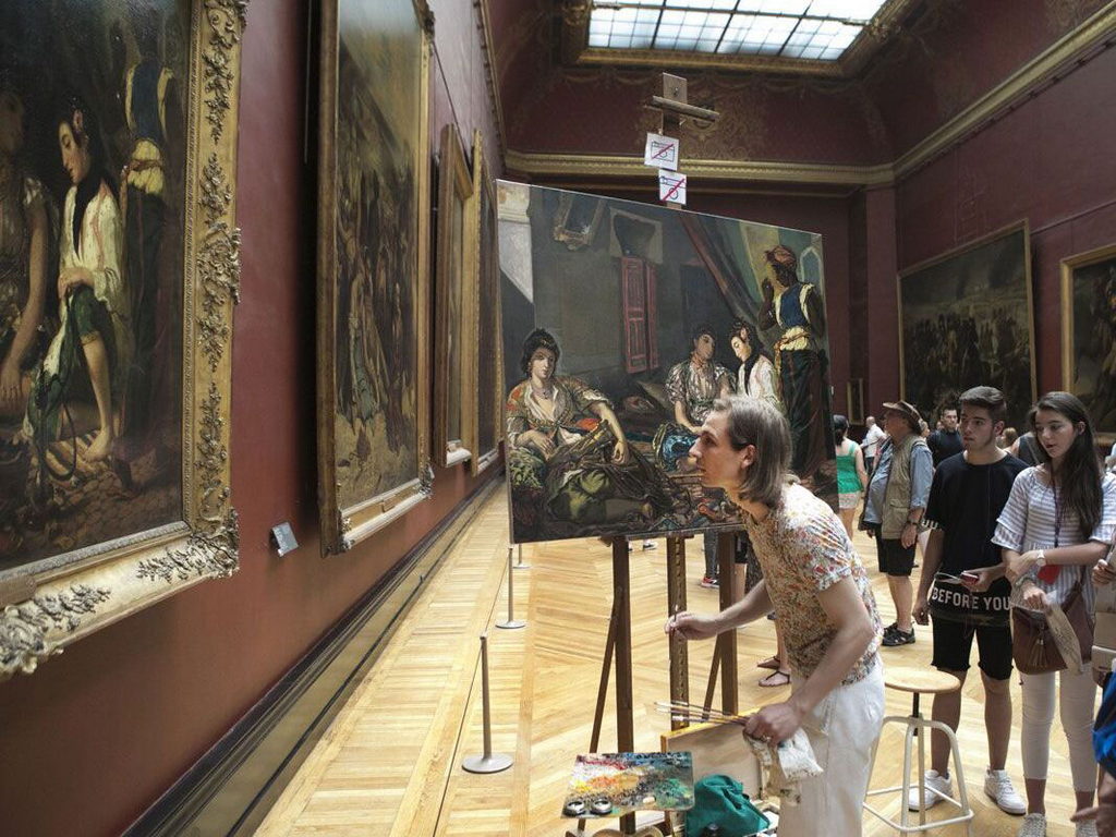 The artist copies a painting by Delacroix